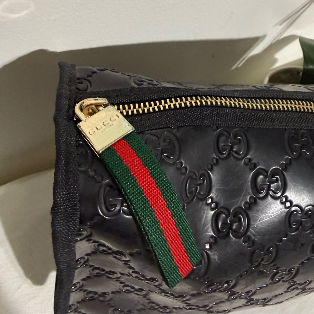 Gucci Cosmetic Embosed Monogram Bag